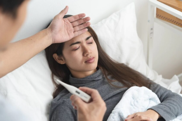 Bị sốt có nhổ răng được không?