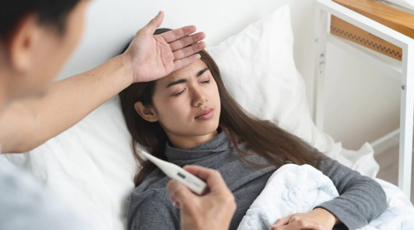 Bị sốt có nên đi nhổ răng không